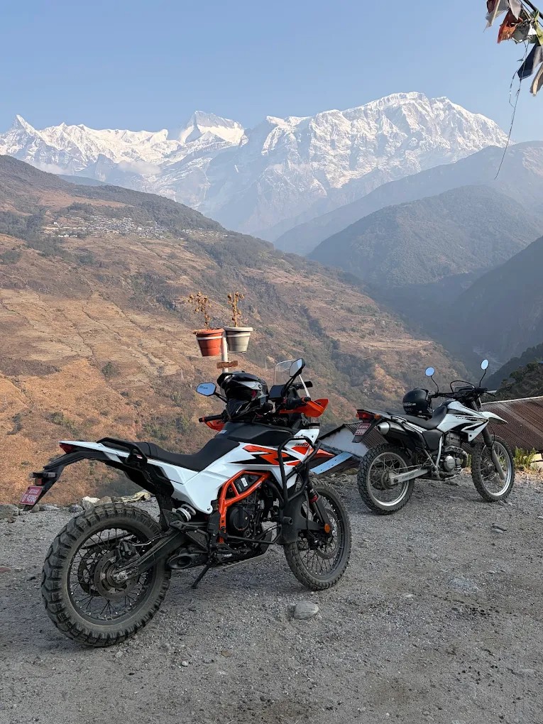 Adventure motorcycles with Himalayan mountain views