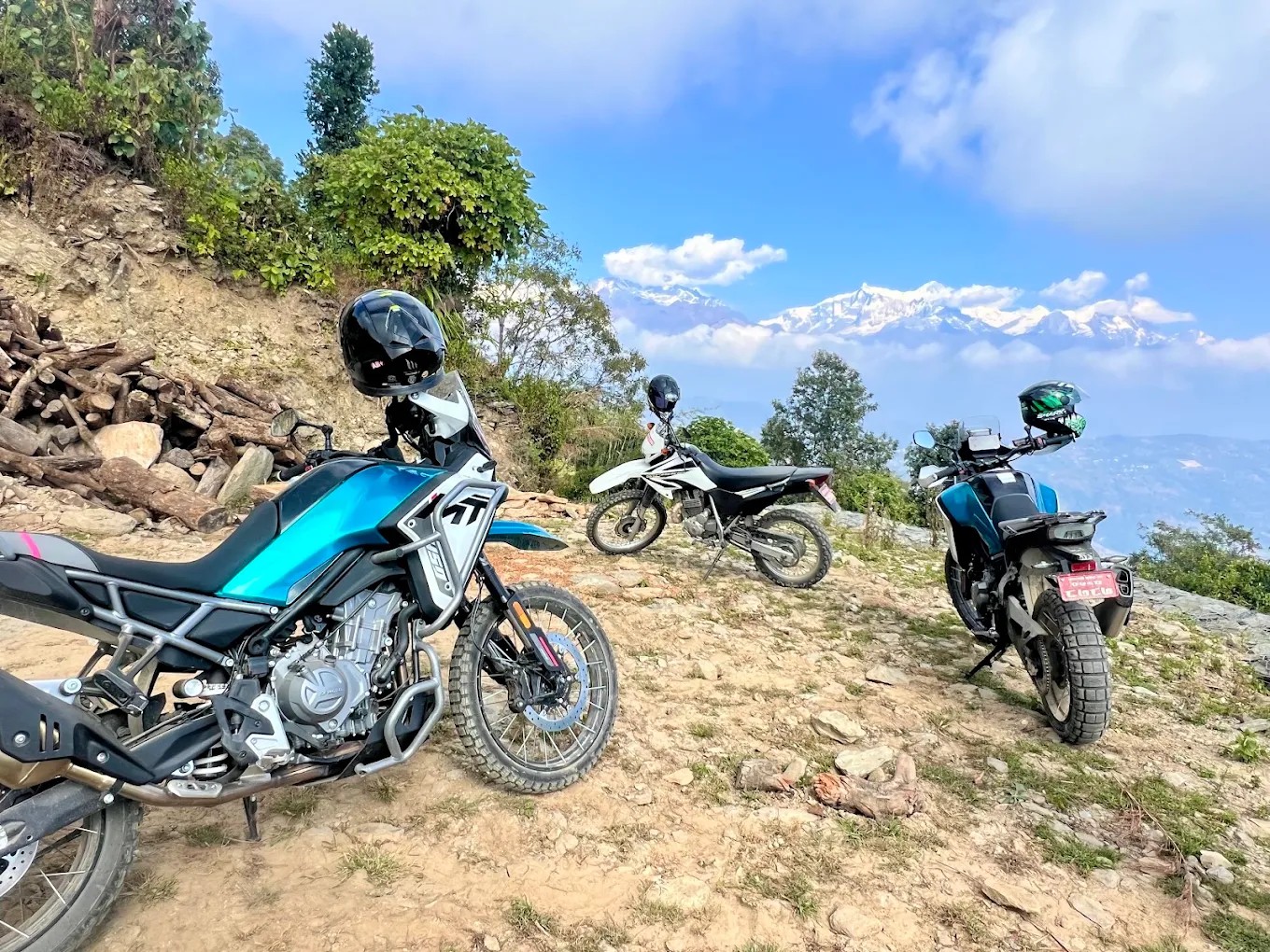 Adventure motorcycles on a scenic ridge