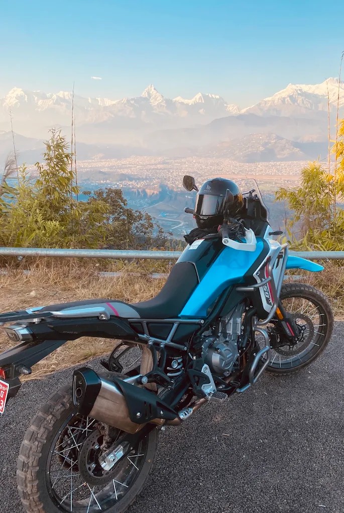 Adventure motorcycle overlooking hills near Pokhara